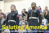 Former NJROTC cadets LCPL Matt Beyersdorf and LCPL Charles Spates stand at attention during 29th Annual Patriotic Concert Nov. 7  in the Event Center.